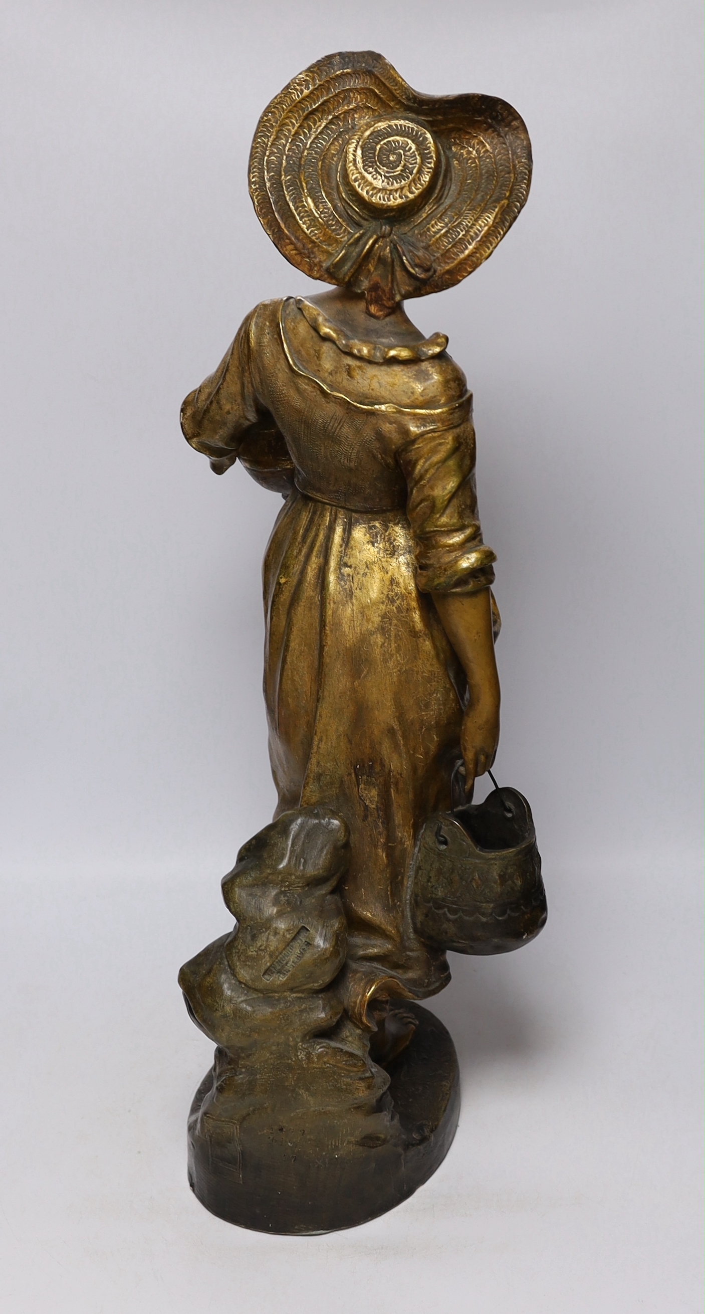 A Lefevre painted earthenware figure of a milkmaid, 65cm